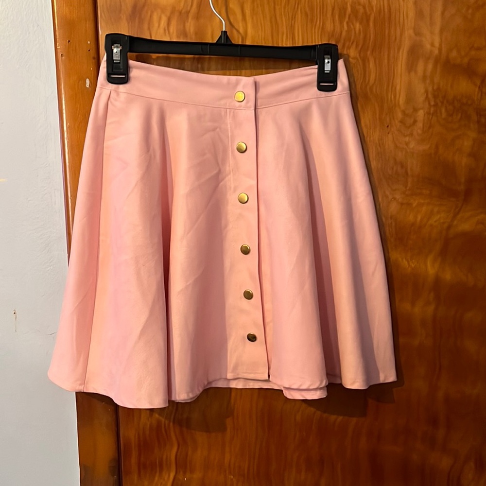Pink button skirt.